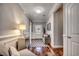 Elegant entryway featuring hardwood floors, wainscoting, and a stylish light fixture at 1903 Francis Ct., Myrtle Beach, SC 29577