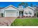Charming single-Gathering home with a well-maintained lawn, two car garage, and welcoming front porch at 1903 Francis Ct., Myrtle Beach, SC 29577