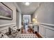 Inviting hallway with hardwood floors, neutral walls, and elegant furnishings at 1903 Francis Ct., Myrtle Beach, SC 29577