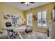 Bright home office with a modern desk, plantation shutters and ample natural light at 1903 Francis Ct., Myrtle Beach, SC 29577