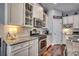Modern kitchen featuring stainless steel appliances, white cabinets, and granite countertops at 1903 Francis Ct., Myrtle Beach, SC 29577