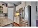 Kitchen details include granite counters, stainless refrigerator, wine rack and pantry at 1903 Francis Ct., Myrtle Beach, SC 29577