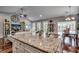 Spacious kitchen island featuring granite countertops, sink and open concept to living spaces at 1903 Francis Ct., Myrtle Beach, SC 29577