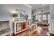 Cozy living room featuring hardwood floors, display cabinet, and neutral-toned furnishings at 1903 Francis Ct., Myrtle Beach, SC 29577