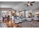 Spacious living area showcasing hardwood floors, a kitchen, and an open layout at 1903 Francis Ct., Myrtle Beach, SC 29577