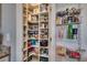 Well-organized walk-in pantry with shelving and wire baskets for ample storage at 1903 Francis Ct., Myrtle Beach, SC 29577
