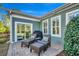 Relaxing outdoor patio with comfortable seating and a view of the well-maintained backyard at 1903 Francis Ct., Myrtle Beach, SC 29577