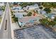 Aerial view of the neighborhood with street view, parking and a colorful home at 2102 S Ocean Blvd. # D, North Myrtle Beach, SC 29582