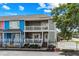 Charming two-story townhome with double balconies and a well-maintained, fenced yard at 2102 S Ocean Blvd. # D, North Myrtle Beach, SC 29582