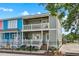 Charming two-story townhome with double balconies and a well-maintained, fenced yard at 2102 S Ocean Blvd. # D, North Myrtle Beach, SC 29582