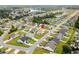Aerial view shows community with single Gathering homes and ponds at 224 Fishburn Dr., Conway, SC 29526