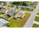 Aerial shows a property with an attached garage and fenced-in backyard at 224 Fishburn Dr., Conway, SC 29526
