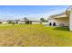 Spacious backyard with lush green grass and a patio space, perfect for entertaining at 224 Fishburn Dr., Conway, SC 29526