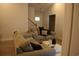 Cozy living room with comfortable seating, neutral decor, and access to the stairs, creating an inviting space at 224 Fishburn Dr., Conway, SC 29526