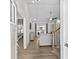Bright and airy living room with luxury vinyl floors and slider door to the back yard at 224 Fishburn Dr., Conway, SC 29526