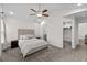 Spacious main bedroom with a walk-in closet and ensuite bathroom, featuring plush carpeting at 224 Fishburn Dr., Conway, SC 29526