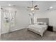 Light-filled main bedroom featuring a ceiling fan, carpeted floors and neutral tones at 224 Fishburn Dr., Conway, SC 29526