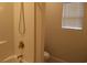 Clean shower stall with a shower head, complemented by the toilet and window, creating a functional space at 224 Fishburn Dr., Conway, SC 29526