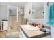 Tidy bathroom featuring a glass-enclosed shower and neutral tile at 238 Robin Dr., Georgetown, SC 29440