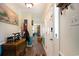 Inviting entryway with hardwood floors, decorative accents, and views into the dining area at 238 Robin Dr., Georgetown, SC 29440