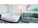 Cozy bedroom featuring a comfortable sofa and adjustable bed frame at 2401 S Ocean Blvd. # 557, Myrtle Beach, SC 29577