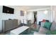 Stylish living room with television, dining area, and comfortable seating at 2401 S Ocean Blvd. # 557, Myrtle Beach, SC 29577