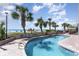 Beautiful outdoor pool surrounded by lush palm trees and lounge chairs, near the beach at 2401 S Ocean Blvd. # 557, Myrtle Beach, SC 29577