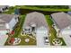 Beautiful aerial view of the home showcasing its landscaping and neighborhood at 251 Juniata Loop, Little River, SC 29566