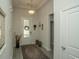 Welcoming entryway features an elegant rug, neutral paint, and decorative accents offering a warm and inviting entrance at 251 Juniata Loop, Little River, SC 29566