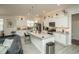Stylish kitchen featuring white cabinets, granite countertops, stainless steel appliances, and an open floor plan at 251 Juniata Loop, Little River, SC 29566