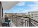 Balcony view of neighborhood offering ample seating, table and beautiful view at 2710 N Ocean Blvd. # 402, Myrtle Beach, SC 29577
