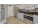 Efficient kitchen area with stainless appliances and modern finishes, ready for cooking at 2710 N Ocean Blvd. # 402, Myrtle Beach, SC 29577