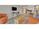 Cozy living room with an open floor plan leading into the kitchen and dining area at 2710 N Ocean Blvd. # 402, Myrtle Beach, SC 29577