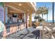 Poolside bar and seating area with ocean views and a relaxed, tropical ambiance at 2710 N Ocean Blvd. # 402, Myrtle Beach, SC 29577