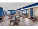 Brightly painted restaurant dining area featuring floor-to-ceiling windows with ocean views at 2710 N Ocean Blvd. # 402, Myrtle Beach, SC 29577