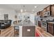 Spacious kitchen island with granite countertop, stainless steel appliances, and hardwood floors at 2757 Zenith Way, Myrtle Beach, SC 29577