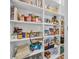 Organized pantry with ample shelving, providing generous storage for food and kitchen essentials at 2757 Zenith Way, Myrtle Beach, SC 29577