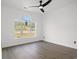 Bedroom with a ceiling fan and a large window that lets in natural light at 2951 Mary Hines Ln., Georgetown, SC 29440