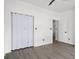 Bedroom with folding closet doors and hard surface floors at 2951 Mary Hines Ln., Georgetown, SC 29440