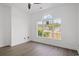 Bedroom with a ceiling fan and a large window that lets in natural light at 2951 Mary Hines Ln., Georgetown, SC 29440