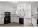 Bright kitchen featuring stainless steel appliances, modern pendant lighting, and sleek black fixtures at 2951 Mary Hines Ln., Georgetown, SC 29440
