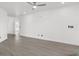 Spacious living room with gray flooring, white walls, recessed lighting, and a ceiling fan at 2951 Mary Hines Ln., Georgetown, SC 29440