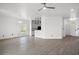 Open-concept living space features modern lighting, neutral color palatte and durable wood-look floors at 2951 Mary Hines Ln., Georgetown, SC 29440