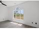 Bedroom with an arched window providing ample natural light and neutral color palatte at 2951 Mary Hines Ln., Georgetown, SC 29440