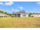 View of the screened porch from the back of the home at 2951 Mary Hines Ln., Georgetown, SC 29440