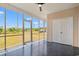 Spacious screened porch with ceiling fan overlooking the yard at 2951 Mary Hines Ln., Georgetown, SC 29440