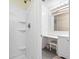 Bright bathroom with a shower, a vanity with a make-up table, and modern lighting fixtures at 3008 Church St. # D3, Myrtle Beach, SC 29577