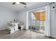 Bright dining area with a banquette table setup and sliding glass doors to the outdoor patio at 3008 Church St. # D3, Myrtle Beach, SC 29577