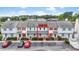 Charming townhome with colorful facade, manicured landscaping, and parking at 3008 Church St. # D3, Myrtle Beach, SC 29577