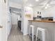 Open layout with bar seating connecting the kitchen to the living area at 3008 Church St. # D3, Myrtle Beach, SC 29577